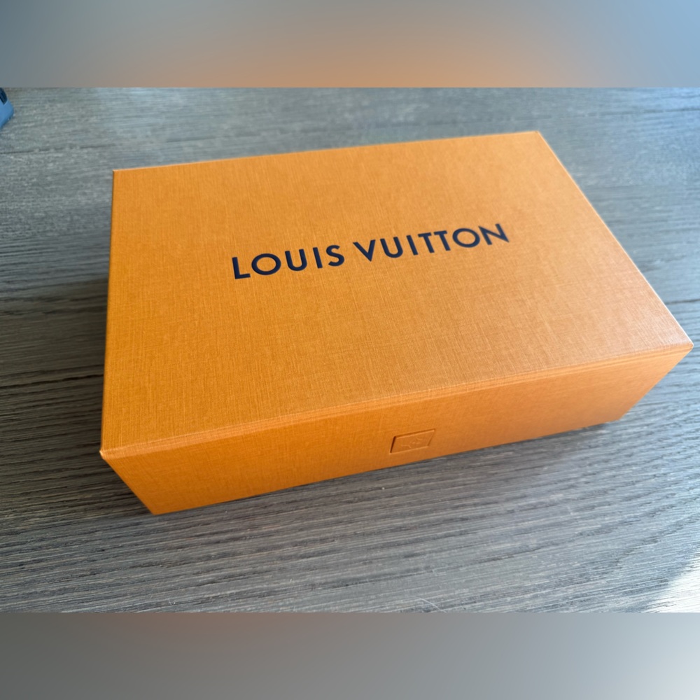 Louis vuitton new orange magnetic box.